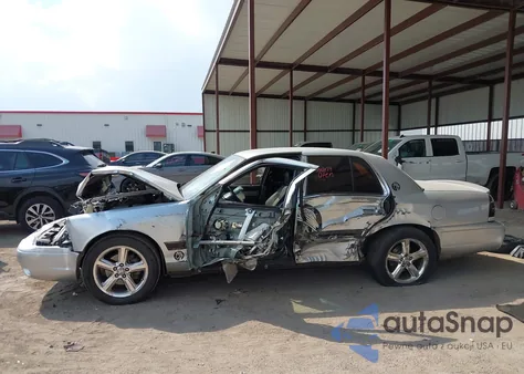 2003 Mercury Marauder from USA, damaged, VIN 2MEHM75V03X616869